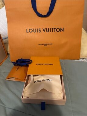 Louis Vuitton empty box with shopping bag